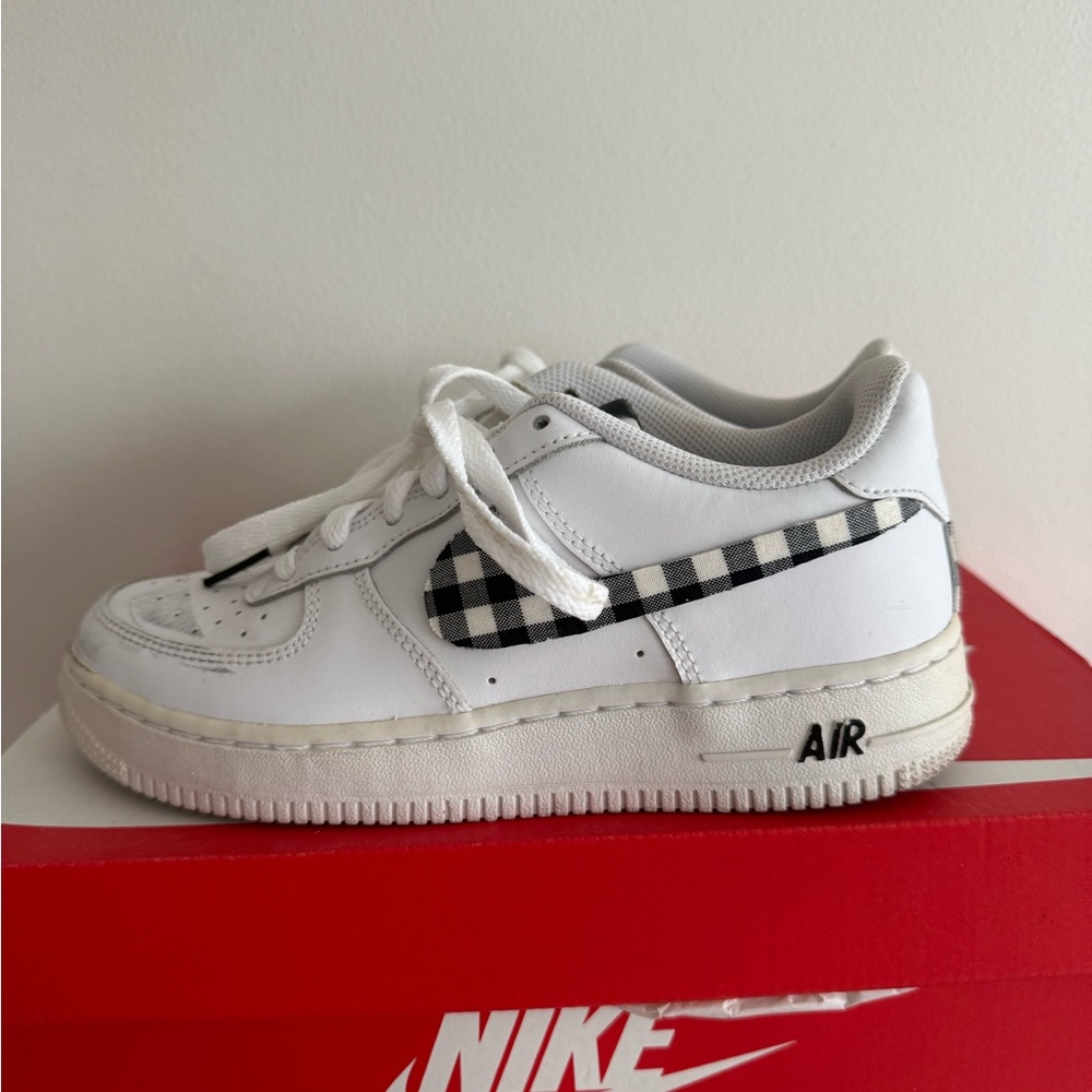 Nike White Sneakers with Black Checkered Swoosh